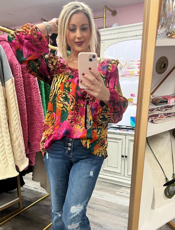 El top de leopardo fucsia